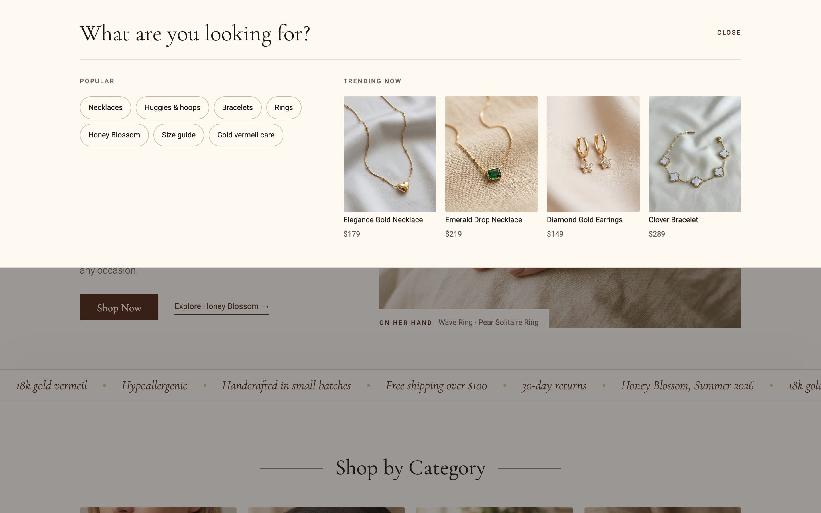 Search panel: “What are you looking for?”, with popular searches as chips and four trending pieces with prices